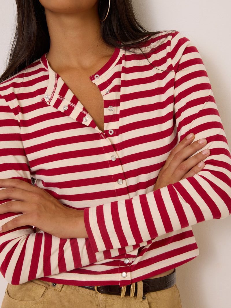 BELLA red striped long-sleeve top worn on a model by Rouje