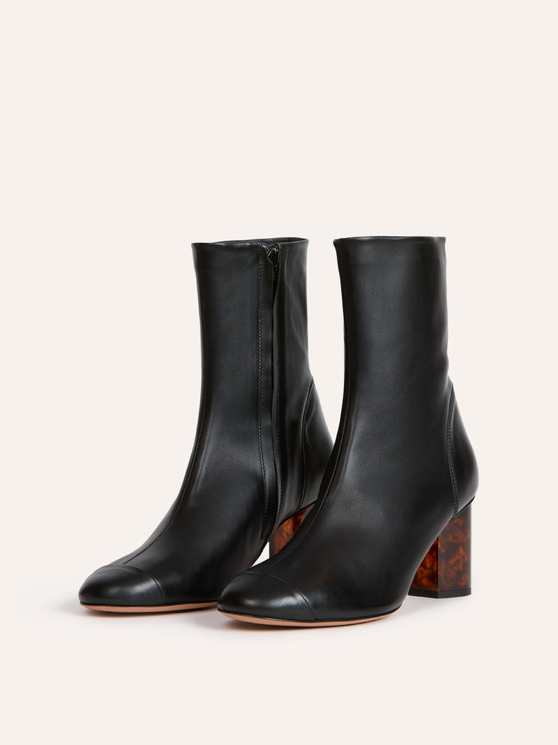 LOULA black leather ankle boots, side view by Rouje
